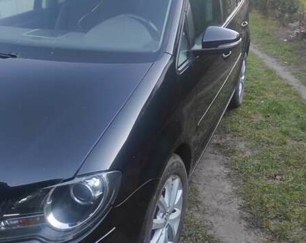 Черный Фольксваген Туран, объемом двигателя 1.39 л и пробегом 207 тыс. км за 7788 $, фото 2 на Automoto.ua