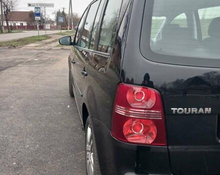 Черный Фольксваген Туран, объемом двигателя 1.6 л и пробегом 249 тыс. км за 7999 $, фото 47 на Automoto.ua