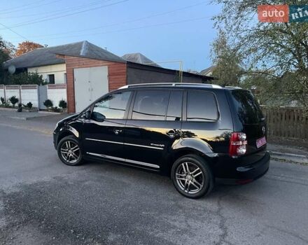 Черный Фольксваген Туран, объемом двигателя 1.4 л и пробегом 238 тыс. км за 7888 $, фото 217 на Automoto.ua