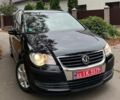 Черный Фольксваген Туран, объемом двигателя 1.6 л и пробегом 150 тыс. км за 8750 $, фото 1 на Automoto.ua