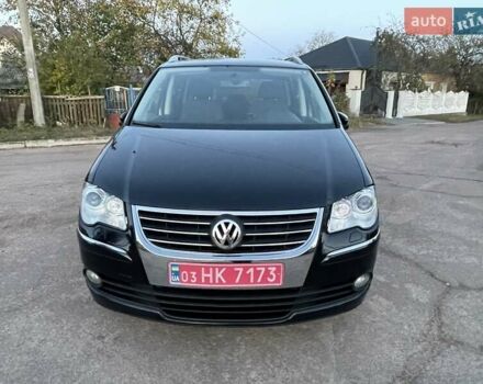 Черный Фольксваген Туран, объемом двигателя 1.4 л и пробегом 238 тыс. км за 7888 $, фото 88 на Automoto.ua