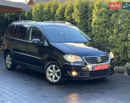 Черный Фольксваген Туран, объемом двигателя 1.4 л и пробегом 199 тыс. км за 7999 $, фото 3 на Automoto.ua