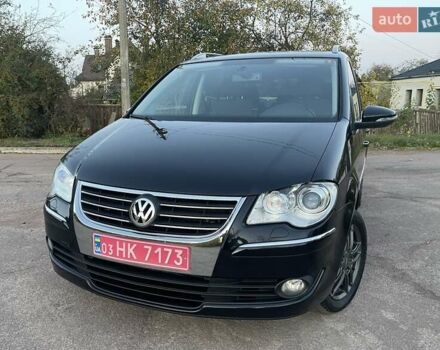 Черный Фольксваген Туран, объемом двигателя 1.4 л и пробегом 238 тыс. км за 7888 $, фото 24 на Automoto.ua