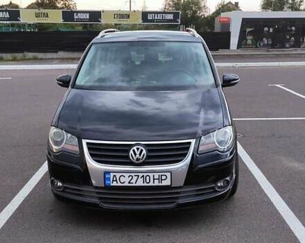 Черный Фольксваген Туран, объемом двигателя 1.39 л и пробегом 195 тыс. км за 8300 $, фото 7 на Automoto.ua