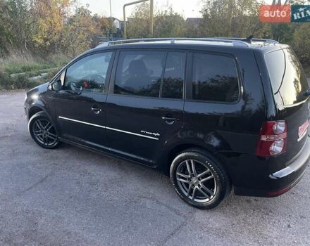 Черный Фольксваген Туран, объемом двигателя 1.4 л и пробегом 238 тыс. км за 7888 $, фото 117 на Automoto.ua