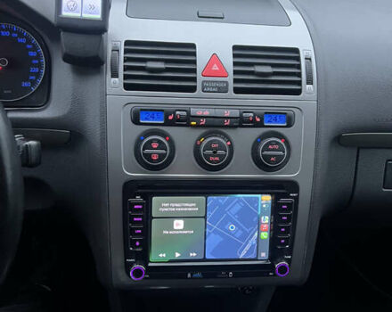 Черный Фольксваген Туран, объемом двигателя 1.4 л и пробегом 213 тыс. км за 8100 $, фото 56 на Automoto.ua