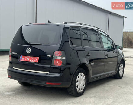 Черный Фольксваген Туран, объемом двигателя 1.4 л и пробегом 213 тыс. км за 8100 $, фото 22 на Automoto.ua