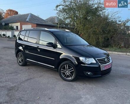 Черный Фольксваген Туран, объемом двигателя 1.4 л и пробегом 238 тыс. км за 7888 $, фото 189 на Automoto.ua