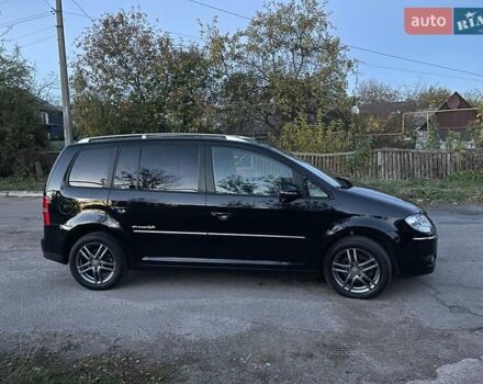 Черный Фольксваген Туран, объемом двигателя 1.4 л и пробегом 238 тыс. км за 7888 $, фото 7 на Automoto.ua