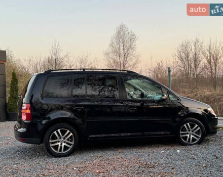 Черный Фольксваген Туран, объемом двигателя 1.6 л и пробегом 215 тыс. км за 7890 $, фото 35 на Automoto.ua