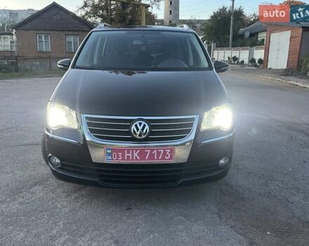 Черный Фольксваген Туран, объемом двигателя 1.4 л и пробегом 238 тыс. км за 7888 $, фото 107 на Automoto.ua