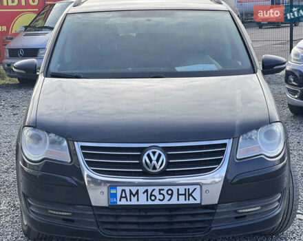 Черный Фольксваген Туран, объемом двигателя 1.4 л и пробегом 290 тыс. км за 6900 $, фото 4 на Automoto.ua