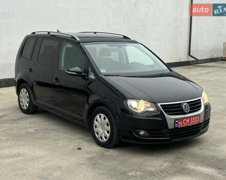 Черный Фольксваген Туран, объемом двигателя 1.4 л и пробегом 213 тыс. км за 8100 $, фото 85 на Automoto.ua