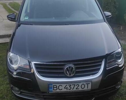 Черный Фольксваген Туран, объемом двигателя 1.39 л и пробегом 207 тыс. км за 7788 $, фото 1 на Automoto.ua