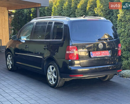 Черный Фольксваген Туран, объемом двигателя 1.4 л и пробегом 199 тыс. км за 7999 $, фото 7 на Automoto.ua