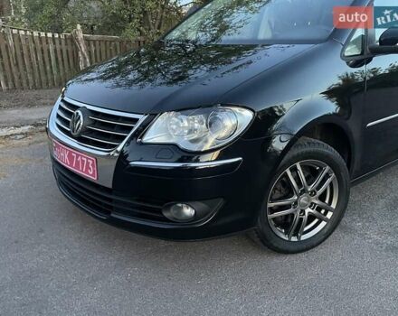 Черный Фольксваген Туран, объемом двигателя 1.4 л и пробегом 238 тыс. км за 7888 $, фото 208 на Automoto.ua
