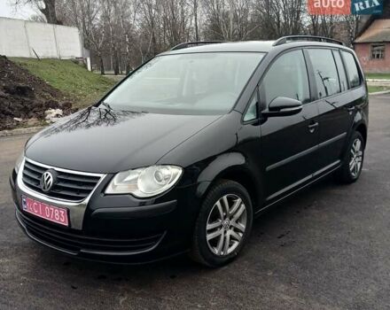 Черный Фольксваген Туран, объемом двигателя 1.6 л и пробегом 249 тыс. км за 7999 $, фото 5 на Automoto.ua