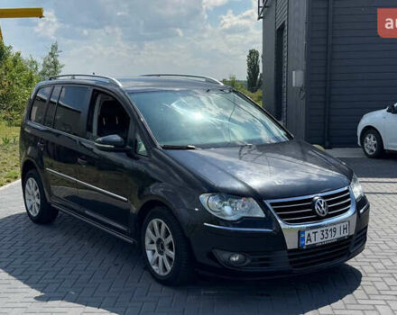 Черный Фольксваген Туран, объемом двигателя 1.97 л и пробегом 285 тыс. км за 7100 $, фото 2 на Automoto.ua