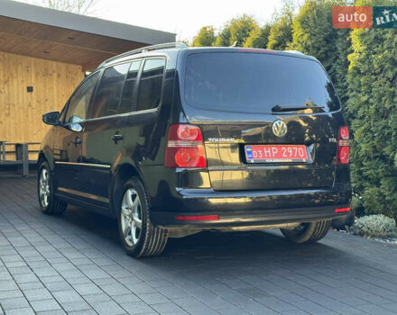 Черный Фольксваген Туран, объемом двигателя 1.4 л и пробегом 199 тыс. км за 7999 $, фото 8 на Automoto.ua