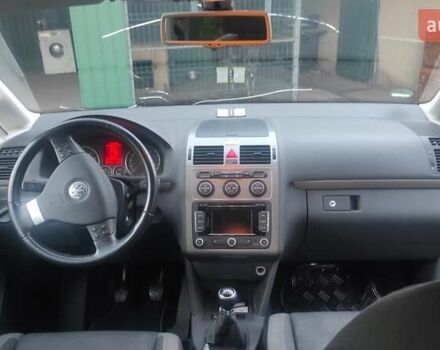 Черный Фольксваген Туран, объемом двигателя 1.39 л и пробегом 207 тыс. км за 7788 $, фото 12 на Automoto.ua