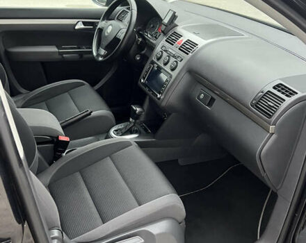 Черный Фольксваген Туран, объемом двигателя 1.4 л и пробегом 213 тыс. км за 8100 $, фото 42 на Automoto.ua