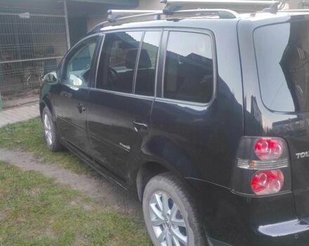 Чорний Фольксваген Туран, об'ємом двигуна 0 л та пробігом 207 тис. км за 8352 $, фото 4 на Automoto.ua