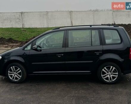 Черный Фольксваген Туран, объемом двигателя 1.6 л и пробегом 249 тыс. км за 7999 $, фото 10 на Automoto.ua