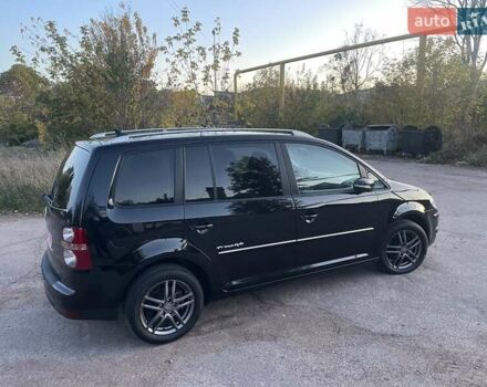 Черный Фольксваген Туран, объемом двигателя 1.4 л и пробегом 238 тыс. км за 7888 $, фото 98 на Automoto.ua