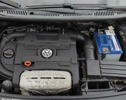 Черный Фольксваген Туран, объемом двигателя 1.39 л и пробегом 195 тыс. км за 8300 $, фото 24 на Automoto.ua