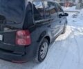 Черный Фольксваген Туран, объемом двигателя 2 л и пробегом 236 тыс. км за 9800 $, фото 1 на Automoto.ua