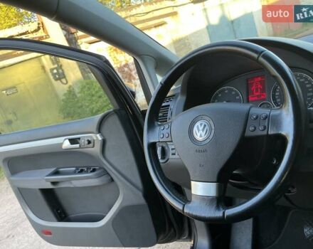 Черный Фольксваген Туран, объемом двигателя 1.4 л и пробегом 238 тыс. км за 7888 $, фото 51 на Automoto.ua