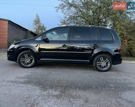 Черный Фольксваген Туран, объемом двигателя 1.4 л и пробегом 238 тыс. км за 7888 $, фото 213 на Automoto.ua