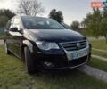 Черный Фольксваген Туран, объемом двигателя 1.97 л и пробегом 258 тыс. км за 9750 $, фото 1 на Automoto.ua