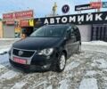 Черный Фольксваген Туран, объемом двигателя 1.4 л и пробегом 226 тыс. км за 8500 $, фото 1 на Automoto.ua