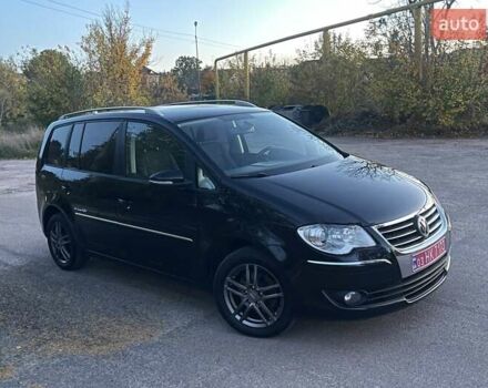 Черный Фольксваген Туран, объемом двигателя 1.4 л и пробегом 238 тыс. км за 7888 $, фото 220 на Automoto.ua