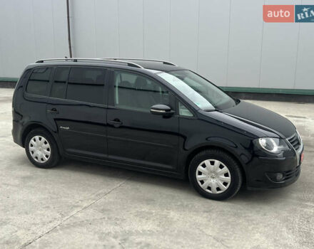 Черный Фольксваген Туран, объемом двигателя 1.4 л и пробегом 213 тыс. км за 8100 $, фото 24 на Automoto.ua