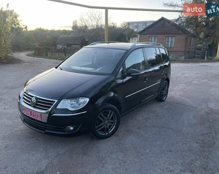 Черный Фольксваген Туран, объемом двигателя 1.4 л и пробегом 238 тыс. км за 7888 $, фото 110 на Automoto.ua