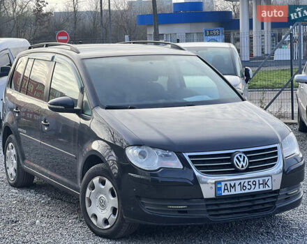 Черный Фольксваген Туран, объемом двигателя 1.4 л и пробегом 290 тыс. км за 6900 $, фото 3 на Automoto.ua