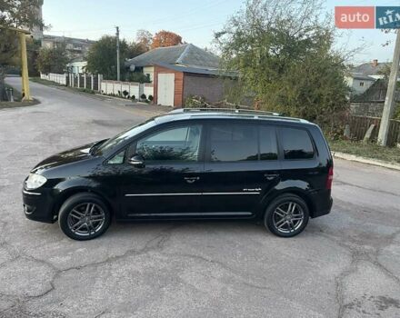 Черный Фольксваген Туран, объемом двигателя 1.4 л и пробегом 238 тыс. км за 7888 $, фото 77 на Automoto.ua