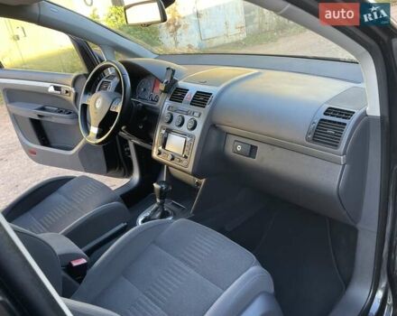 Черный Фольксваген Туран, объемом двигателя 1.4 л и пробегом 238 тыс. км за 7888 $, фото 230 на Automoto.ua