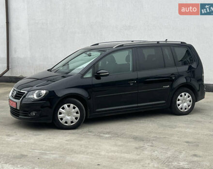 Черный Фольксваген Туран, объемом двигателя 1.4 л и пробегом 213 тыс. км за 8100 $, фото 18 на Automoto.ua