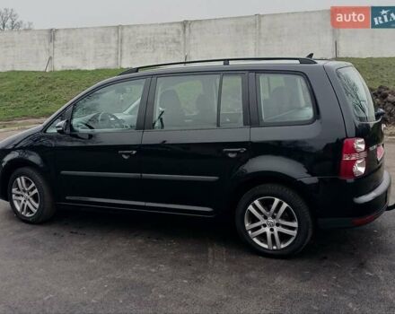 Черный Фольксваген Туран, объемом двигателя 1.6 л и пробегом 249 тыс. км за 7999 $, фото 12 на Automoto.ua