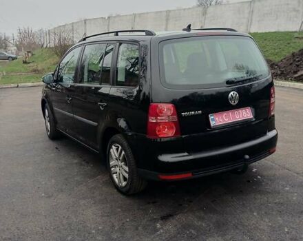 Черный Фольксваген Туран, объемом двигателя 1.6 л и пробегом 249 тыс. км за 7999 $, фото 15 на Automoto.ua
