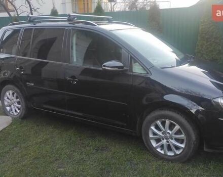 Черный Фольксваген Туран, объемом двигателя 1.39 л и пробегом 207 тыс. км за 7788 $, фото 8 на Automoto.ua