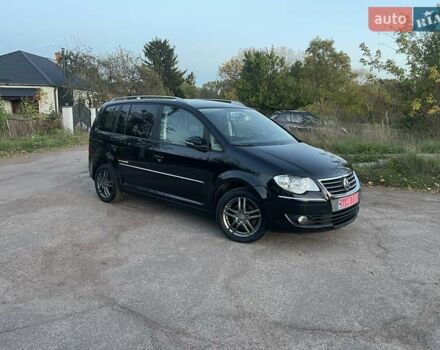 Черный Фольксваген Туран, объемом двигателя 1.4 л и пробегом 238 тыс. км за 7888 $, фото 90 на Automoto.ua