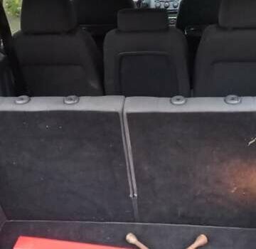 Черный Фольксваген Туран, объемом двигателя 1.9 л и пробегом 180 тыс. км за 11669 $, фото 6 на Automoto.ua