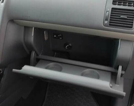 Черный Фольксваген Туран, объемом двигателя 1.39 л и пробегом 195 тыс. км за 8300 $, фото 25 на Automoto.ua