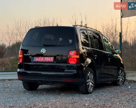 Черный Фольксваген Туран, объемом двигателя 1.6 л и пробегом 215 тыс. км за 7890 $, фото 34 на Automoto.ua