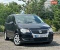 Чорний Фольксваген Туран, об'ємом двигуна 1.97 л та пробігом 338 тис. км за 8000 $, фото 1 на Automoto.ua