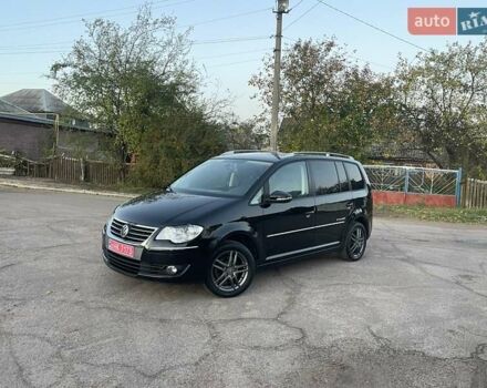 Черный Фольксваген Туран, объемом двигателя 1.4 л и пробегом 238 тыс. км за 7888 $, фото 16 на Automoto.ua